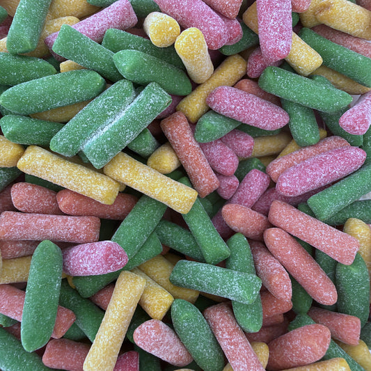 Gros plan bonbons HITSCHIES Mix Acidulé multicolores en vrac